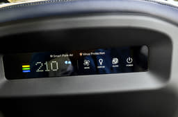 Kia Carens Air purifier is flush in the driver's seat backrest; is noisy though.